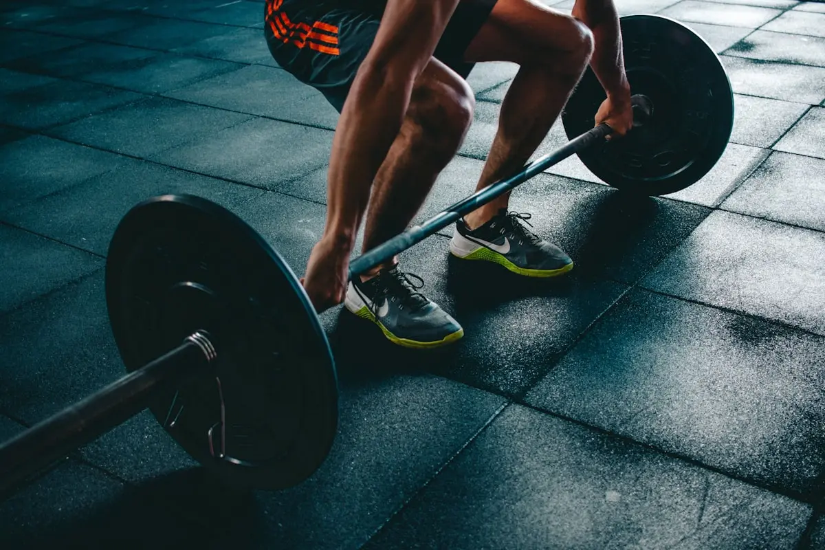 Athlete stretching after workout — omega-3 and exercise recovery